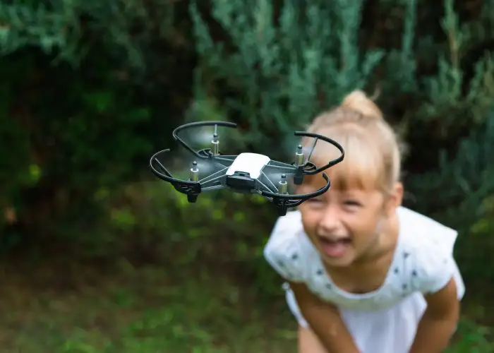 small drone and girl