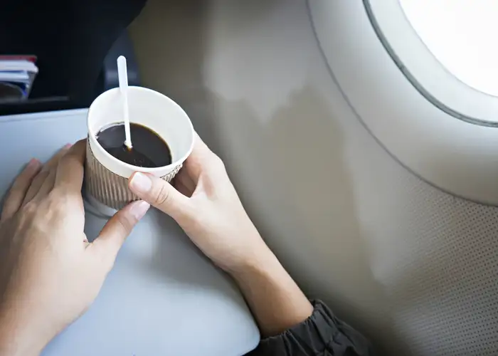 coffee on airplane tray table