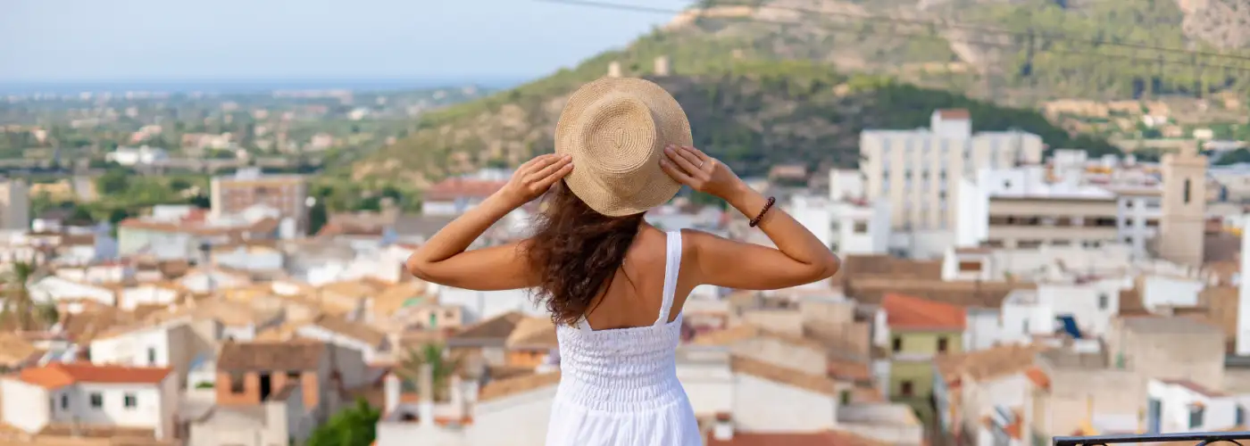 girl wearing hat on vacation.