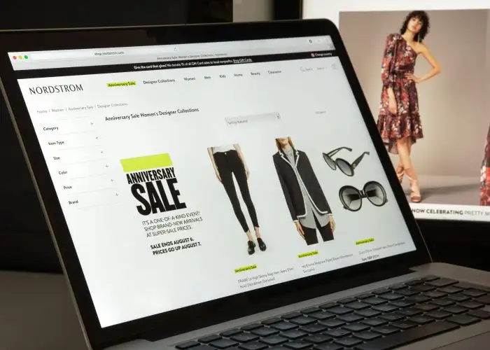 Nordstrom sale page on laptop.