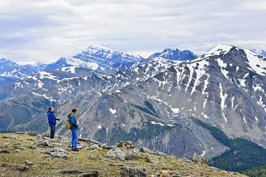 Hikers enjoying scenic canadian rocky mountains view in jasper national park