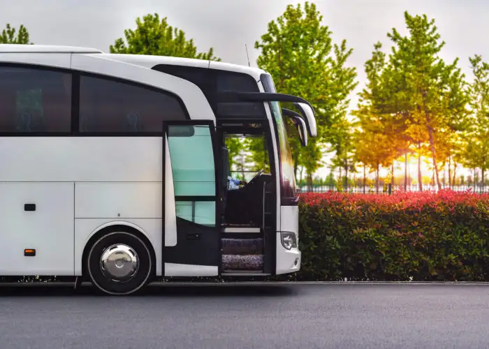 Luxury bus waiting for passengers in parking lot