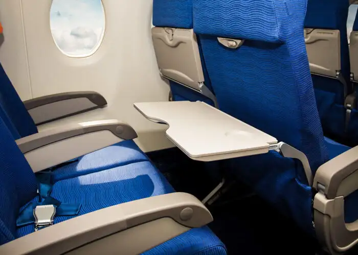 airplane seats empty tray table down