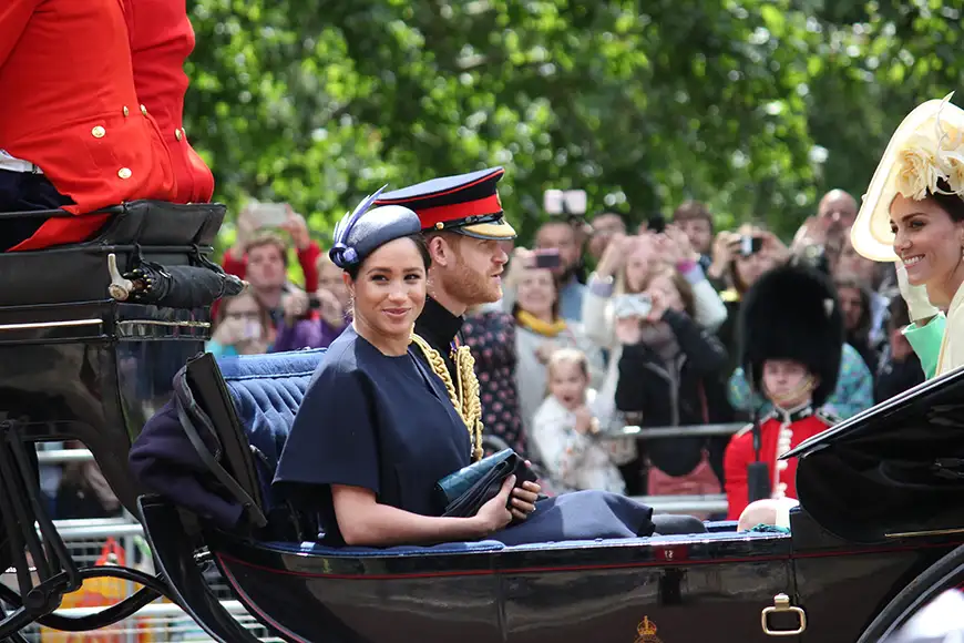 meghan markle in royal carriage with prince harry and kate middleton.