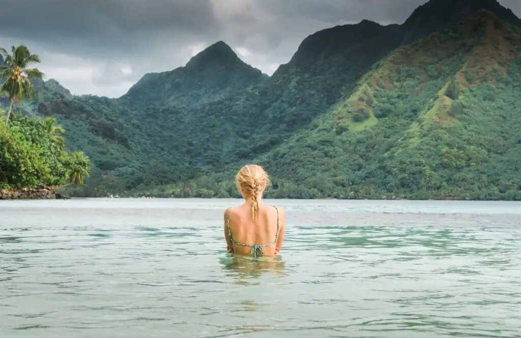 woman in ocean in tahiti