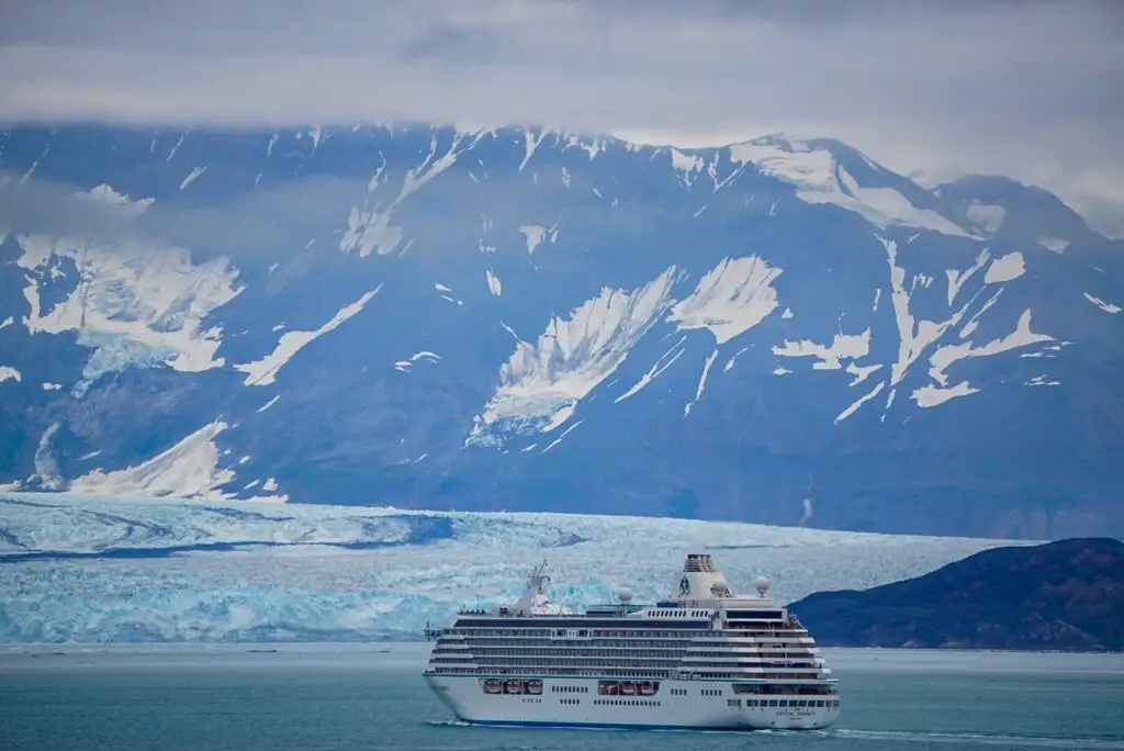 alaska iceberg with cruise ship