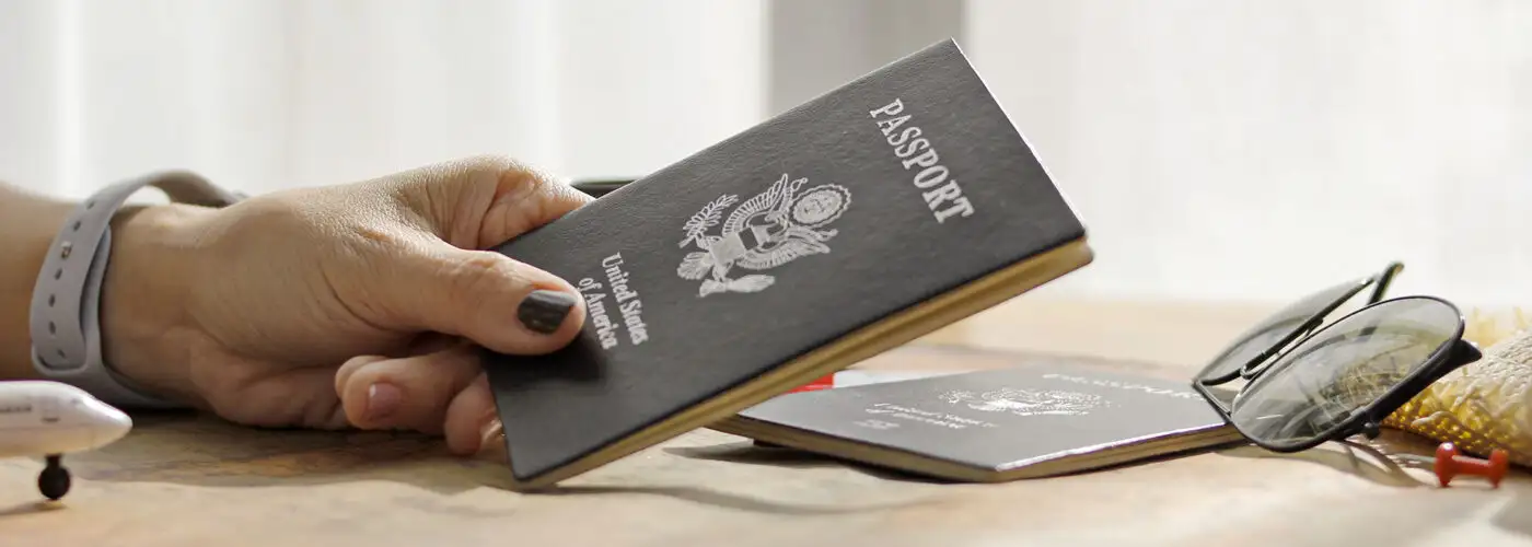 hand holds a United States passport