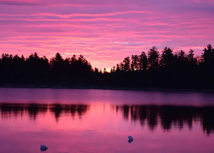 sunrise over moosehead lake maine.