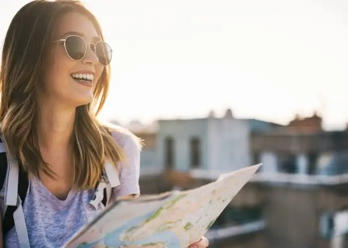 woman traveler looking at map