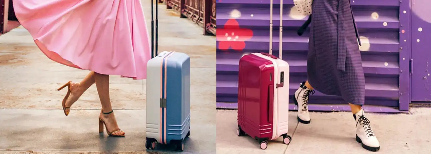 Two women with personalized luggage