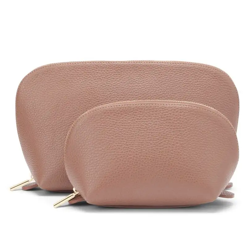 Pink Cuyana's Leather Travel Case Set in two sizes