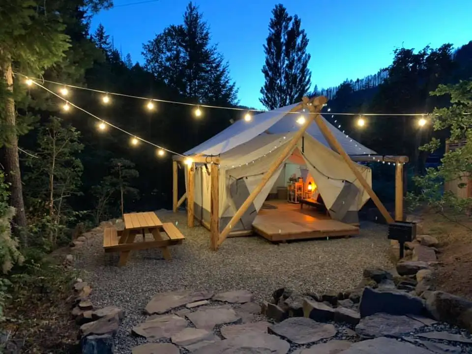 Glamping tent and outdoor area at Umpqua's Last Resort, Wilderness Cabins, RV Park & Glamping