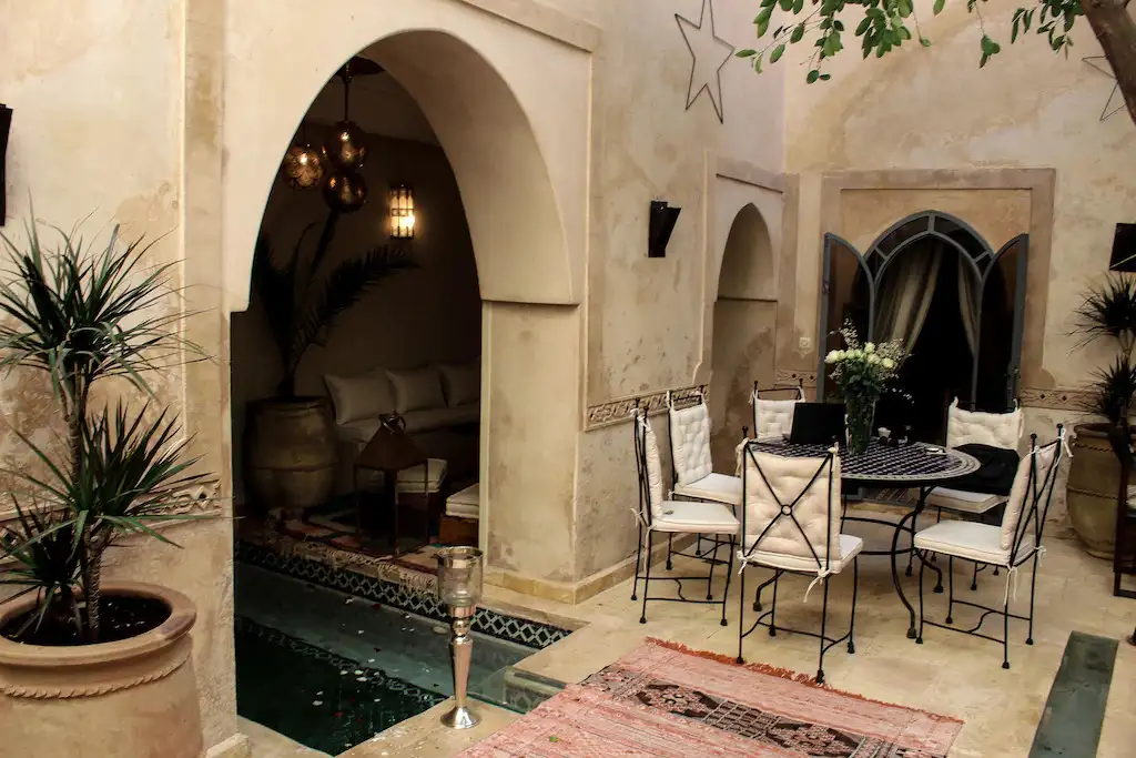 A sitting area and archway in a vacation home in Marrakech, Morocco