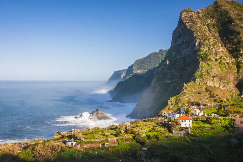View of mountains and ocean on coast near Boaventura, Madeira island, Portugal