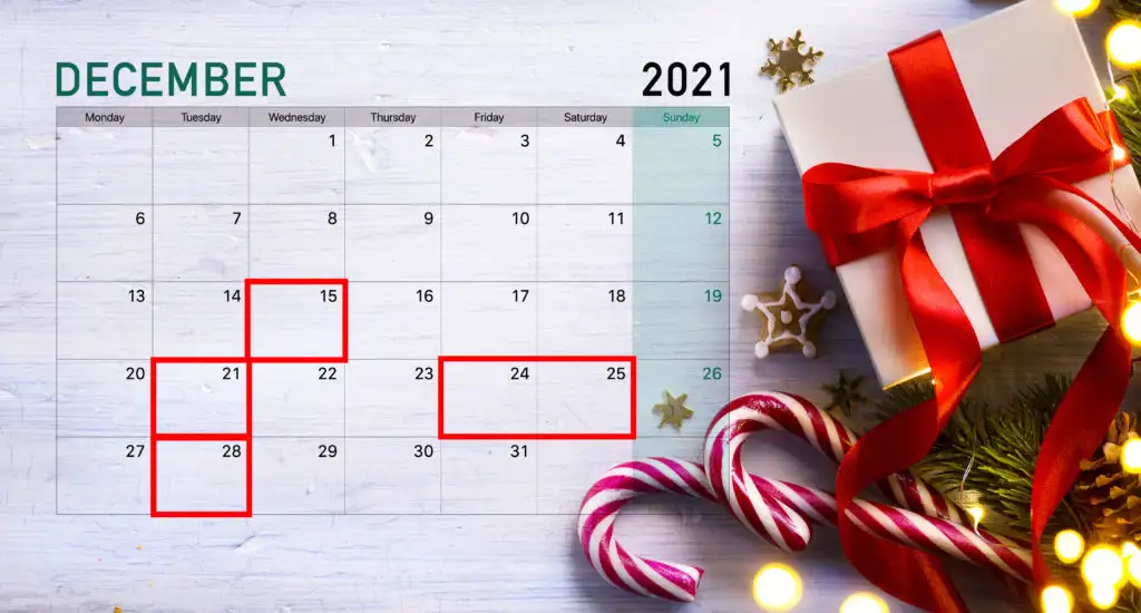 Calendar on Christmas backdrop showing the best days to fly during the Christmas season 2021