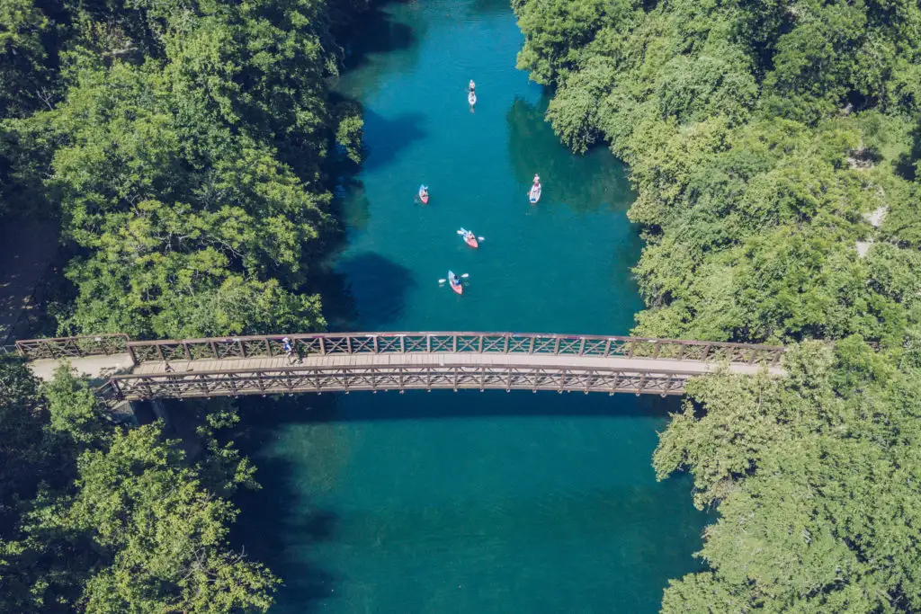 Aerial view of people kayaking in Barton Springs in Austin, Texas