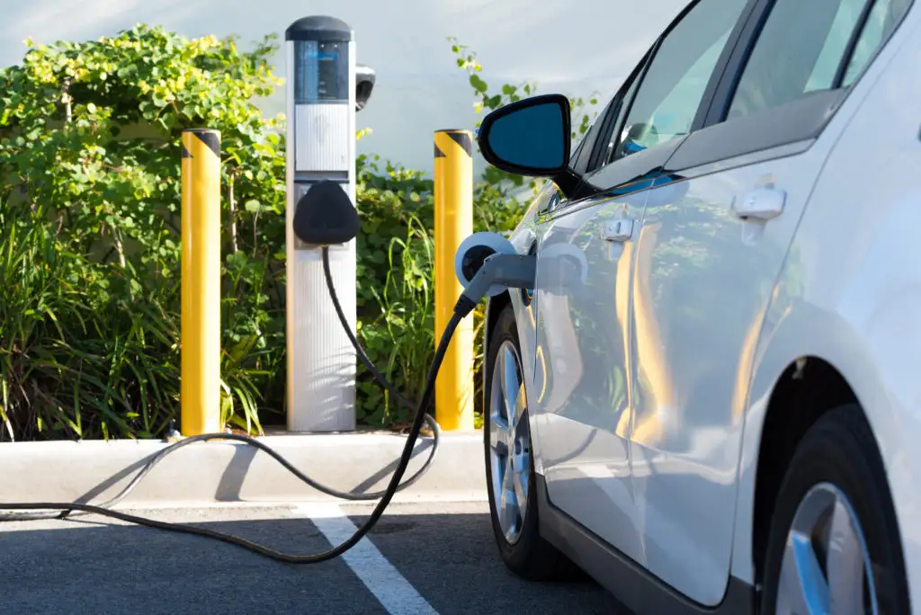 Hybrid car charging at a car charging station