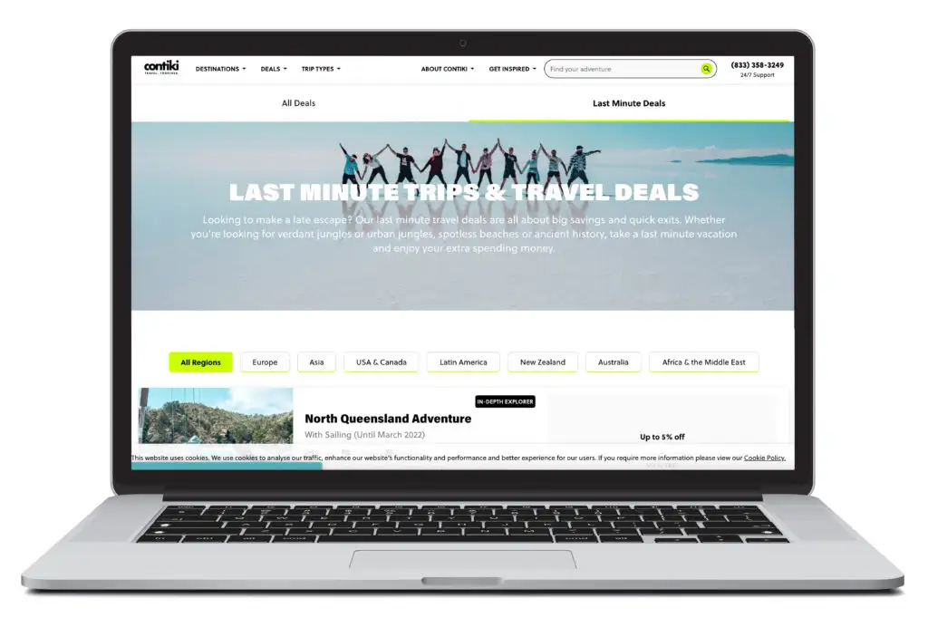 An open laptop showing the last minute deals page of tour and travel booking site Contiki
