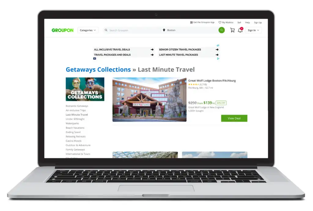 An open laptop showing the homepage of Groupon, a site where you can make last minute bookings