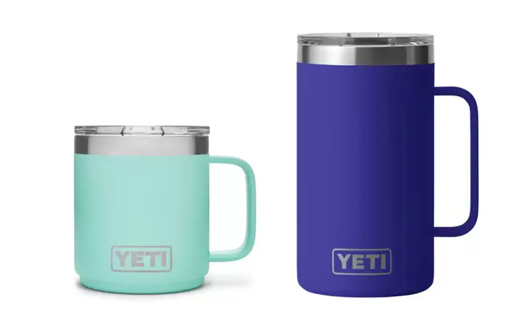 Two sizes of YETI insulated travel mugs in light teal and dark blue