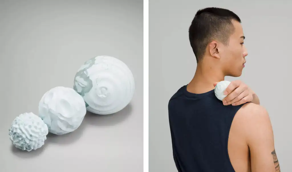 lululemon Release and Recover Ball Set in the color Silver Blue/Sheer Blue (left) and person using the Release and Recover Ball Set on shoulder (right)