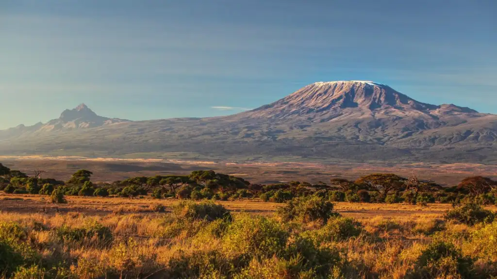 Mount Kilimanjaro seen from a distance over the African savanna