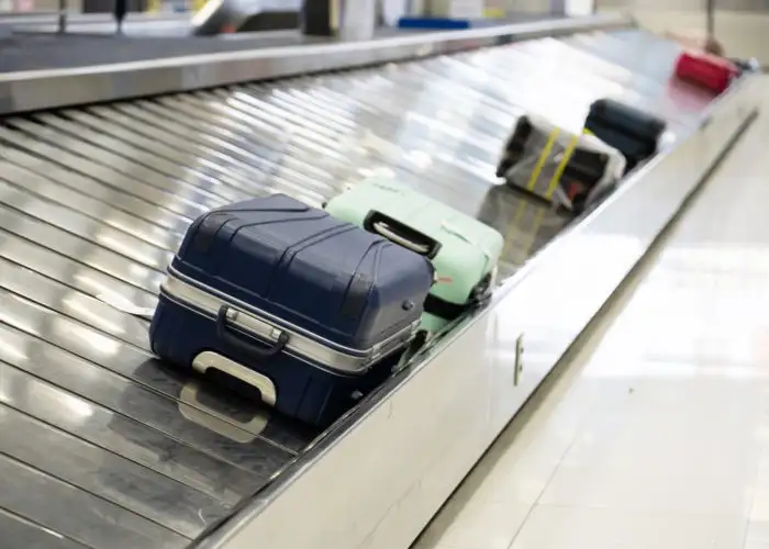 Bags on a baggage carousel in an airport