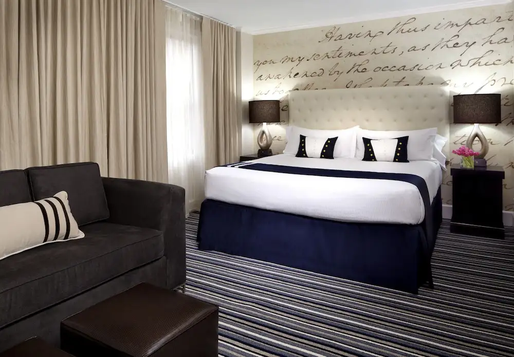Bedroom at The George Hotel operated by Kimpton in Washington DC, United States