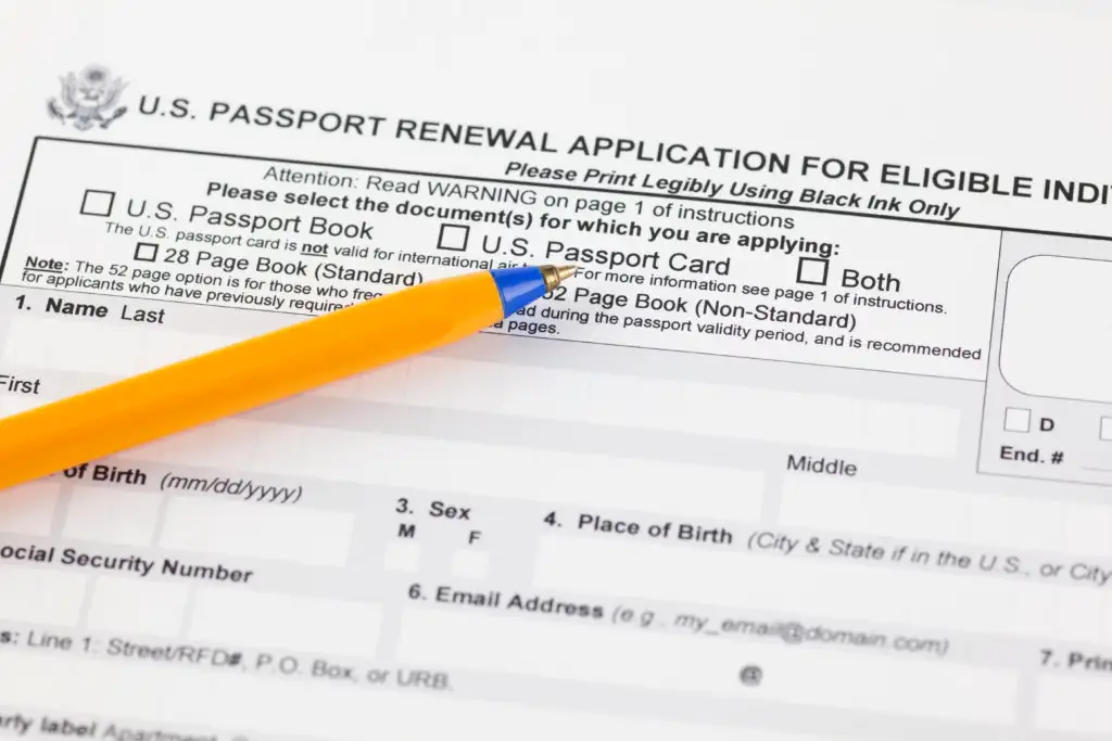 Close up of a US passport renewal form with a pencil on top