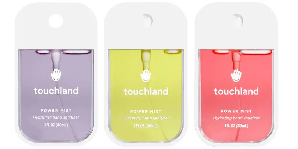A purple, yellow, and pink Touchland Power Mist Hydrating Hand Sanitizer small spray bottle