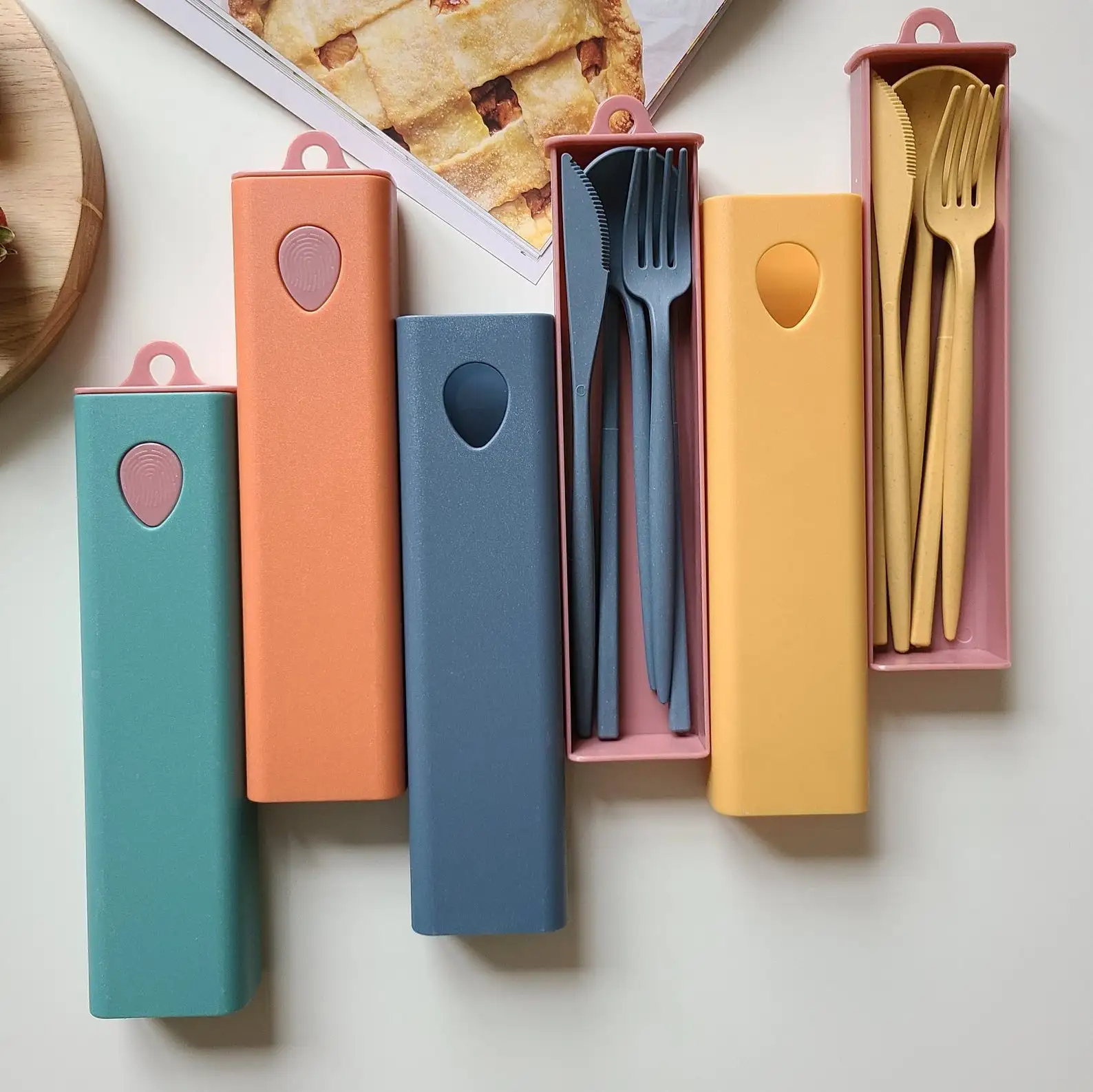 Reusable cutlery sets in colorful carrying cases
