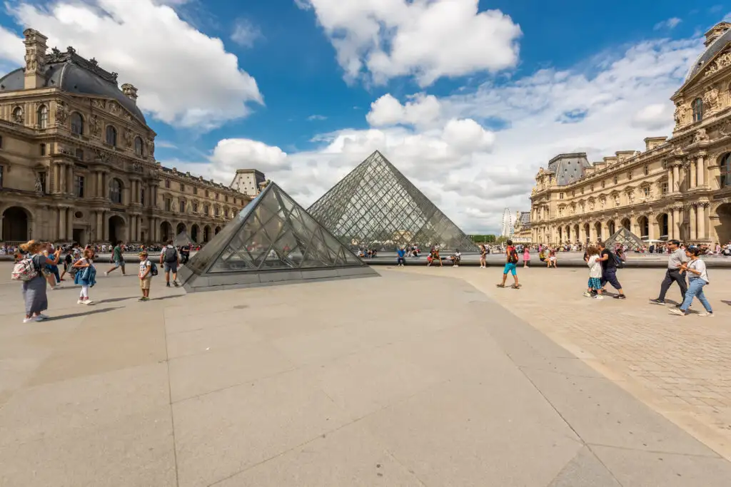 Exterior courtyard of the Louvre in Paris, France on a sunny day