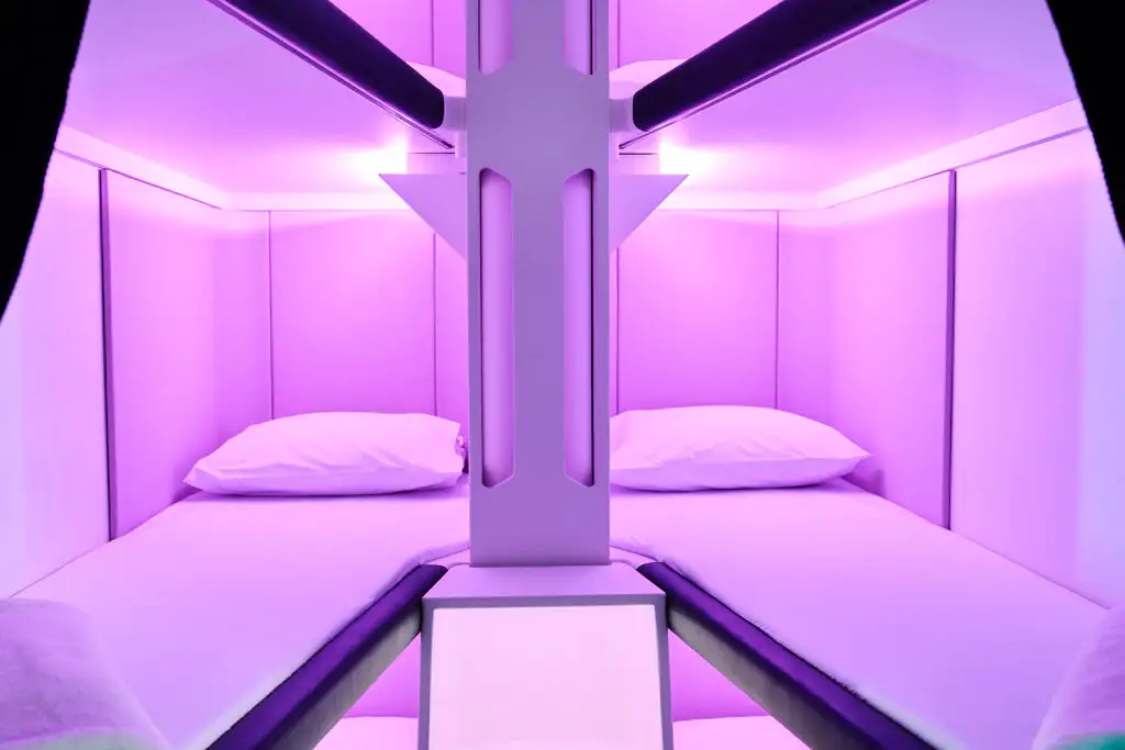 Renderings of the Air New Zealand Skynests, lay-flat economy airline seats resemble bunk beds