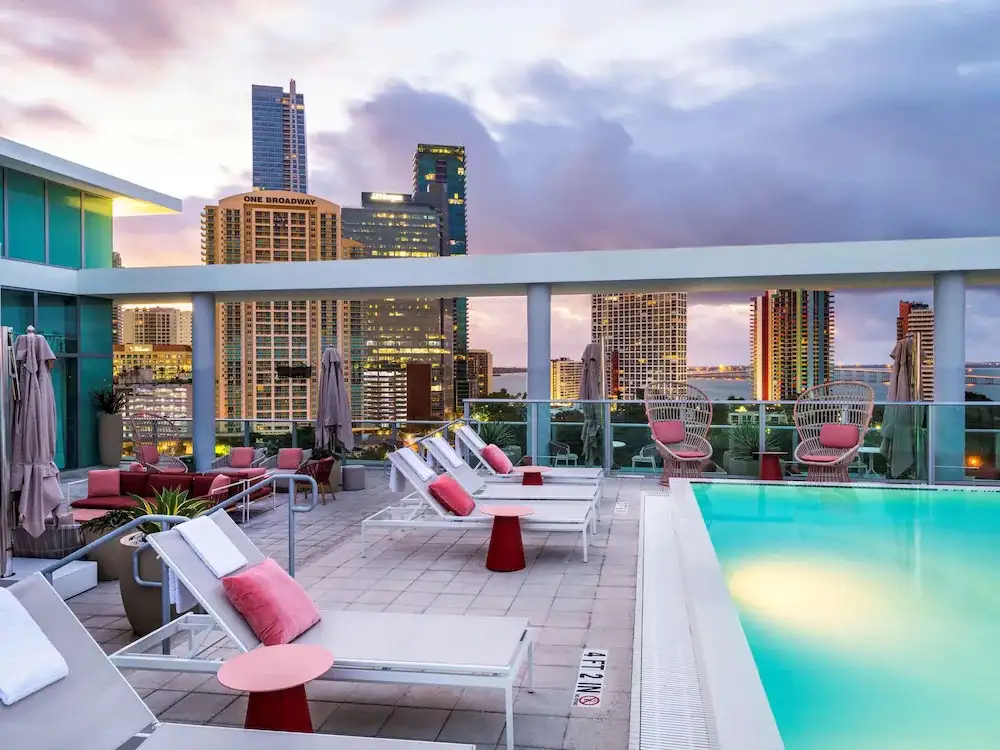 Rooftop pool and bar at sunset at the Novotel Miami Brickell