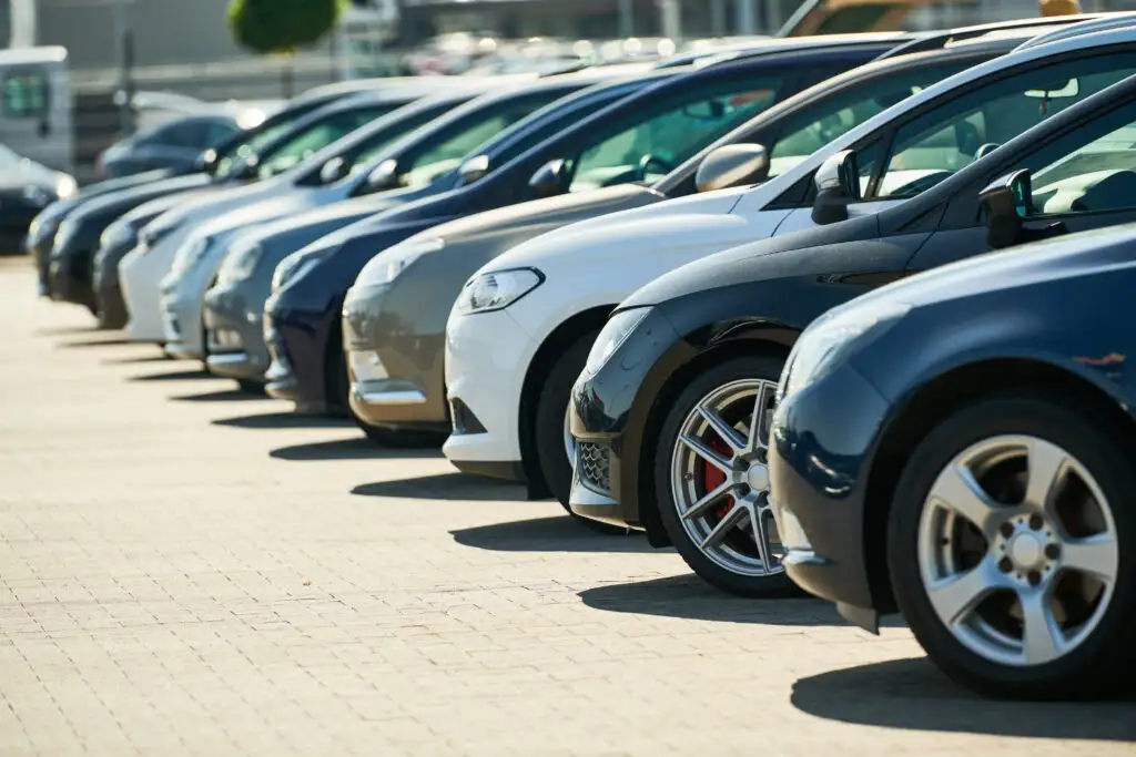 Row of cars on car rental lot