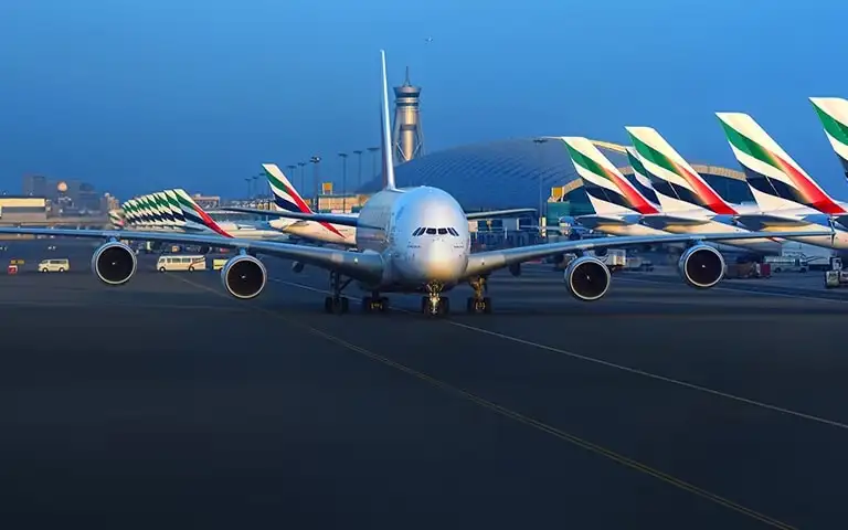 A fleet of Emirates aircraft on the tarmac