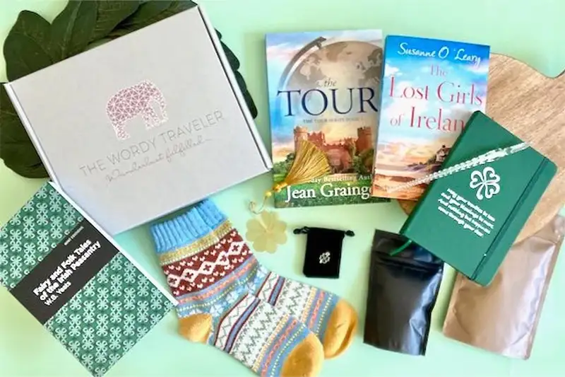 Books and reading related gear included in the Wordy Traveler subscription box, a great gift for travelers