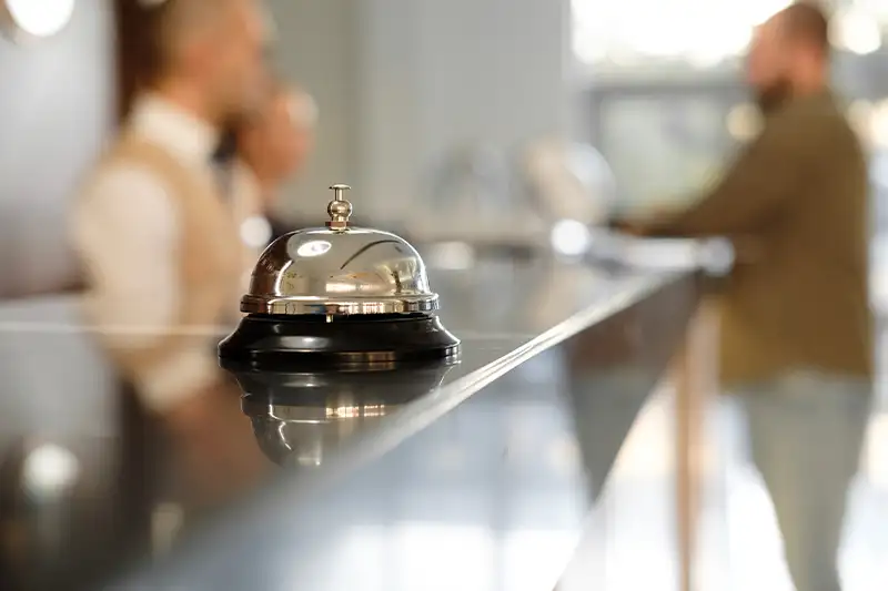 Bell at front desk reception in a hotel