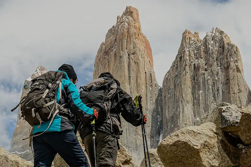 People hiking in the surrounding nature of Patagonia near Las Torres Patagonia Hotel