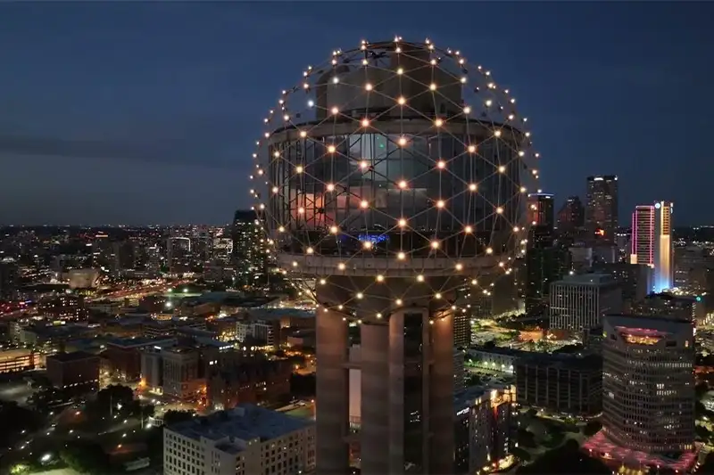 The Reunion Tower in Dallas, Texas lit up at night