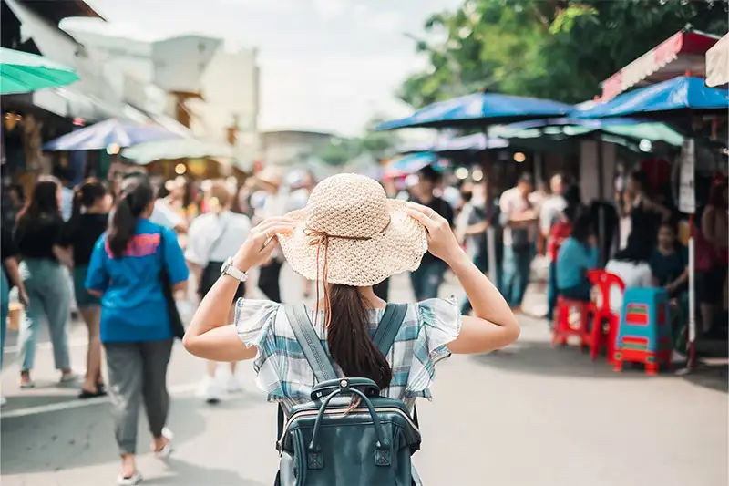 Woman traveling alone on streets of Bangkok