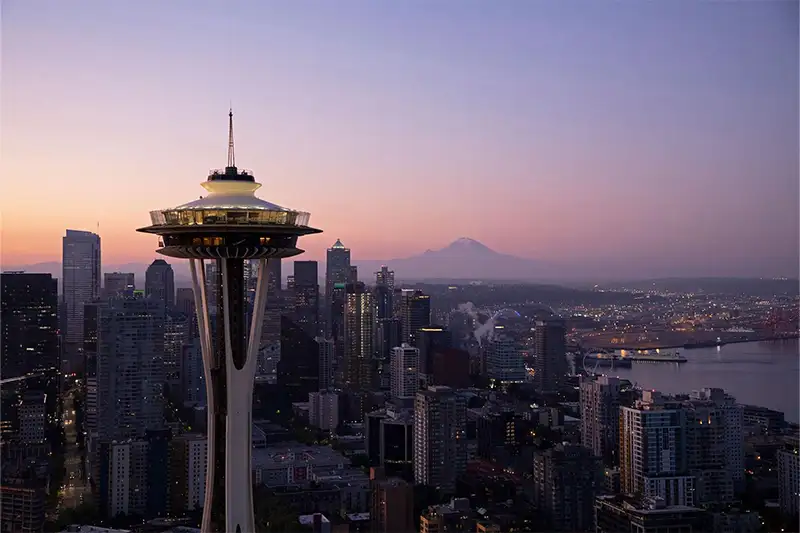 The Space Needle in Seattle, seen at a distance at sunset