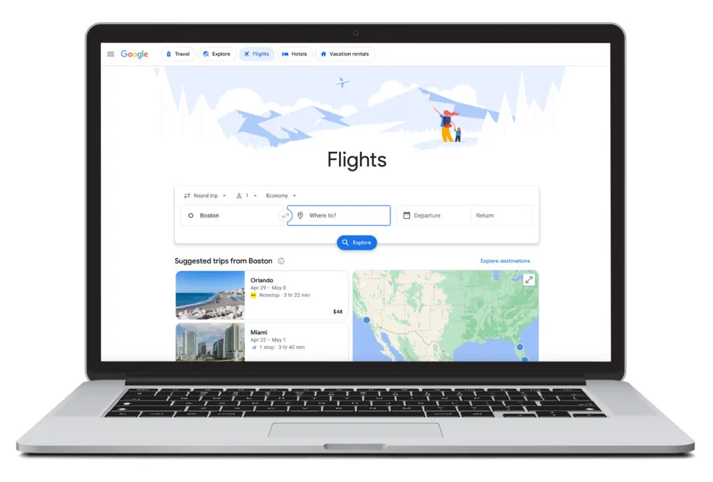 Open laptop showing the flight search homepage for Google Flights