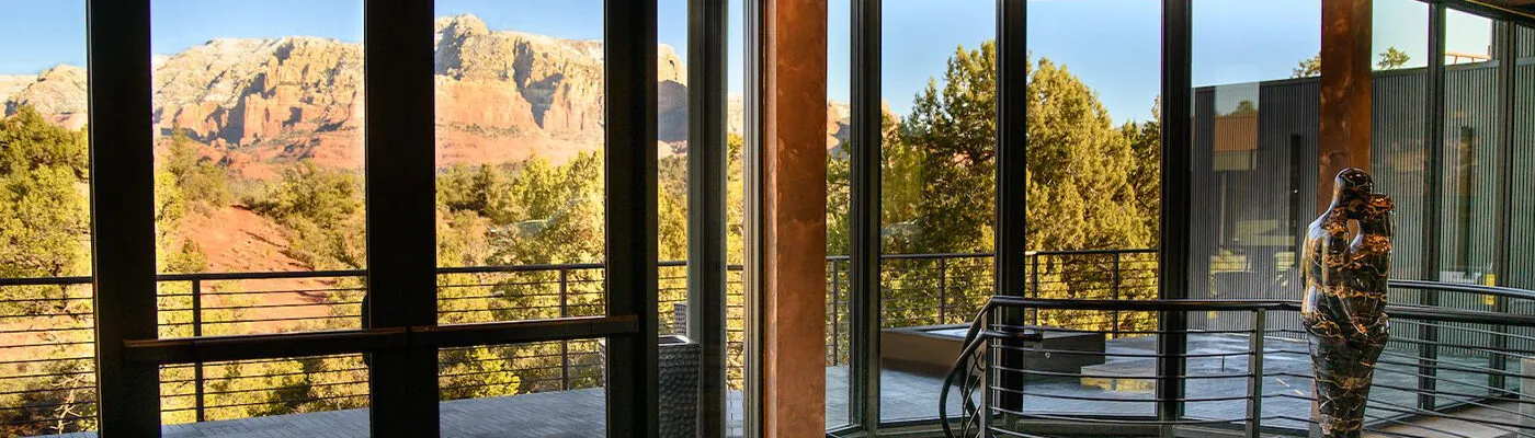 Glass-walled common area at Ambiente hotel in Sedona