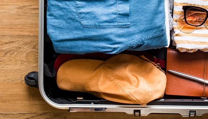 Packed suitcase on a hard wood floor