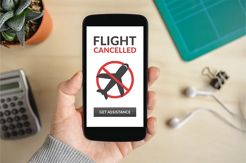 Phone showing flight cancellation status