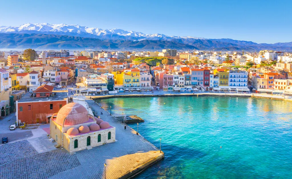 Aerial view of Chania with the amazing lighthouse, mosque, venetian shipyards, Crete, Greece.